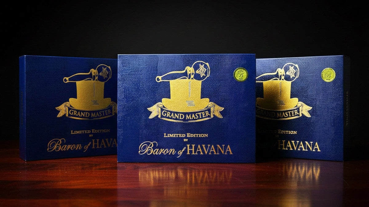 Three Grand Master Limited Edition cigar boxes by Baron of HAVANA on polished dark wood