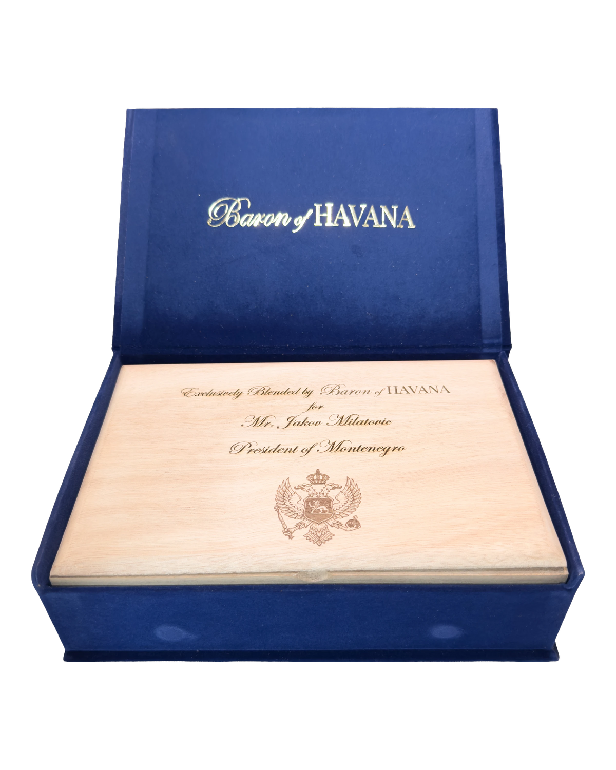 The cedar lid engraved for the President of a sovereign nation, with the country's coat of arms.