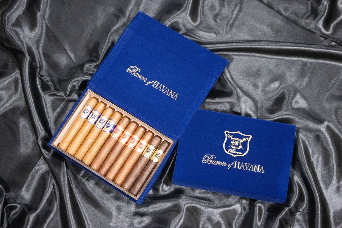 Mild, medium and full body cigars side by side in an open Baron of HAVANA box