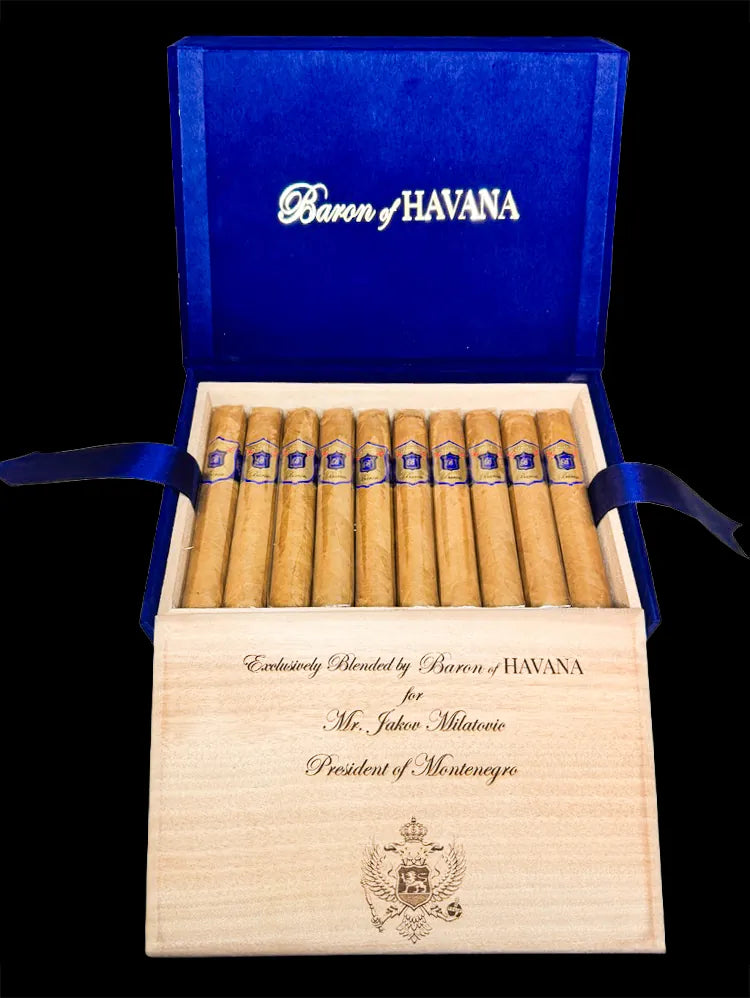 An open Baron of HAVANA box of cigars with an engraved lid