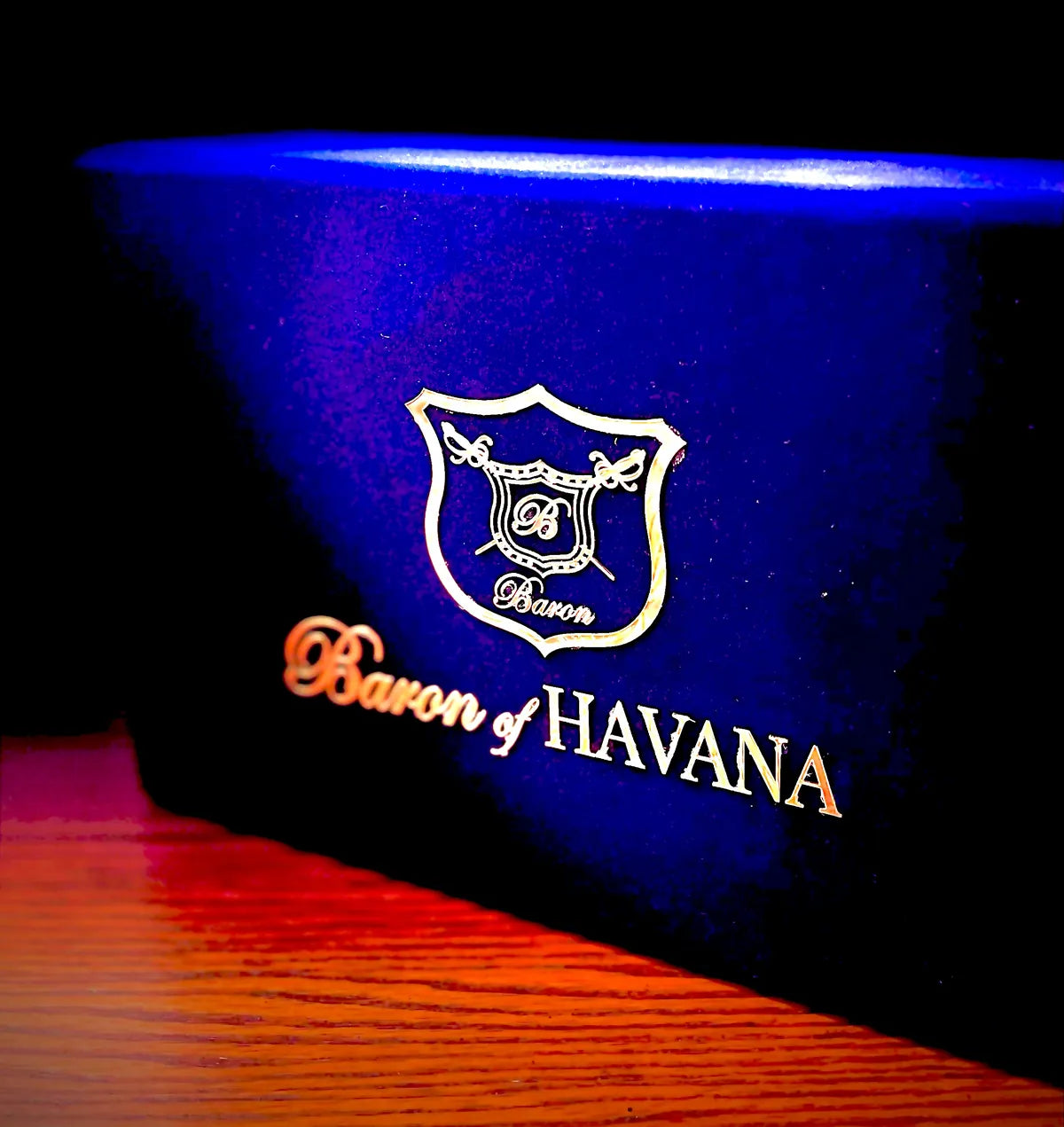A Napoleon-blue velvet Baron of HAVANA box with its gold embossed crest